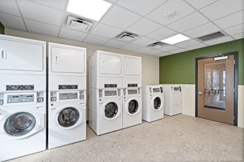 Community laundry room at Sierra on 66